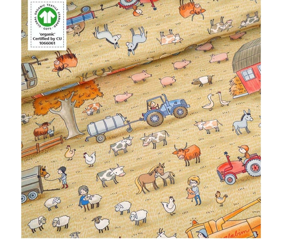 On the farm (yellow) organic jersey fabric
