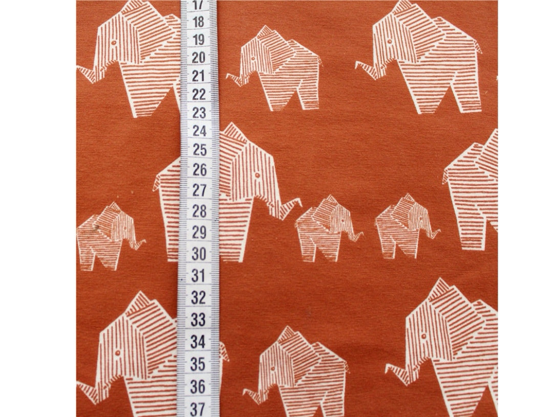 Geometric elephants (caramel) organic jersey fabric