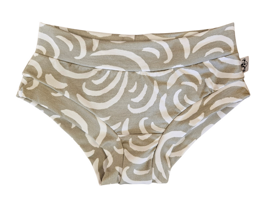Women's brief underpants with tiger stripes on grey background 