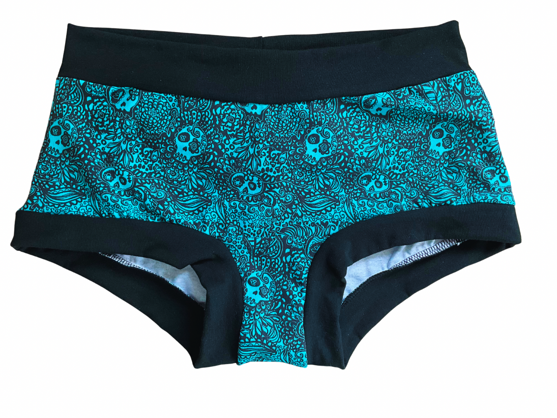 Boyshort style underwear with skulls print on turquoise background 