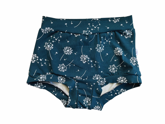 High waisted women’s underpants with dandelions print on dark background 