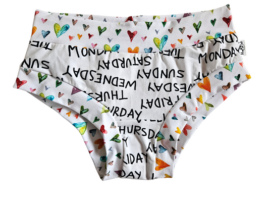 Women´s brief underpants with weekdays and rainbow hearts print