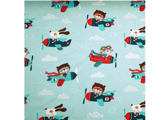 Cute cats and dogs flying airplanes in the sky. 
