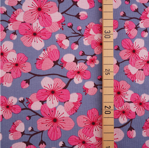 pink cherry blossoms on blue background