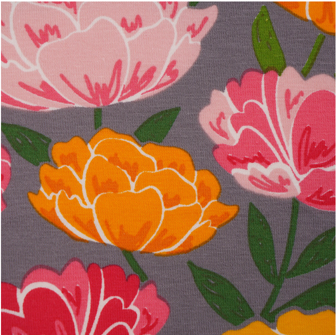 pink and yellow peonies on grey background