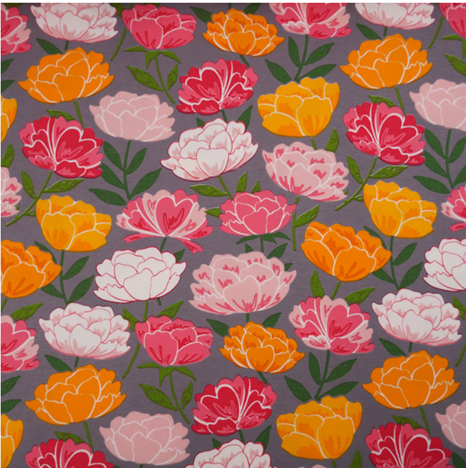 Pink and yellow peony flowers on grey background