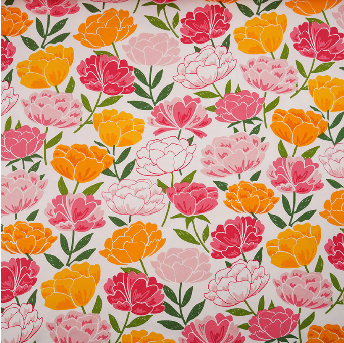 pink and yellow peonies on white background