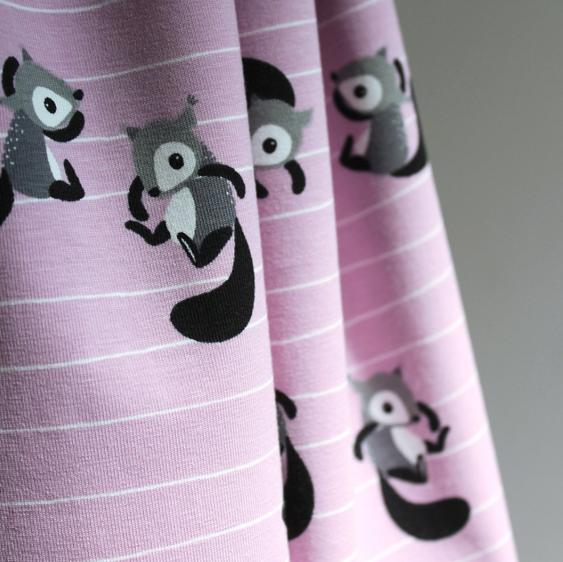 organic striped jersey fabric with cute squirrels motive on puple pink background