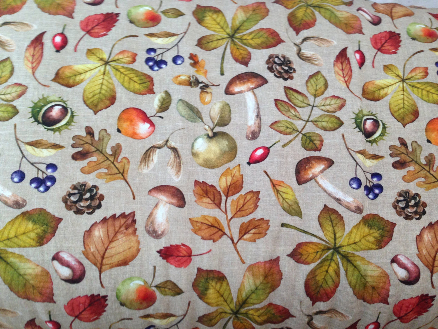 Organic jersey fabric with grey burlap cloth optic background and fall foliage pattern: Colorful leaves, mushrooms, rosehips, apples, chestnuts, blue berries, pine cones