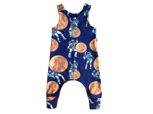 Dark blue harem romper with astronaut and moon outer space print